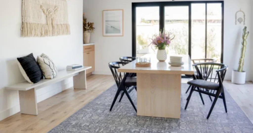 Add a Soft Area Rug Under the Dining Table