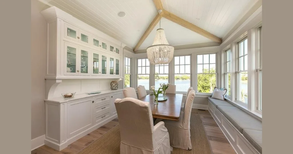 Elegant Dining Room With Fireplace and Built In Window Seating