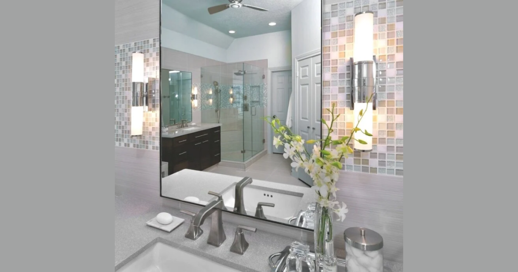 Double Sconces Beside and Slightly Above Mirror