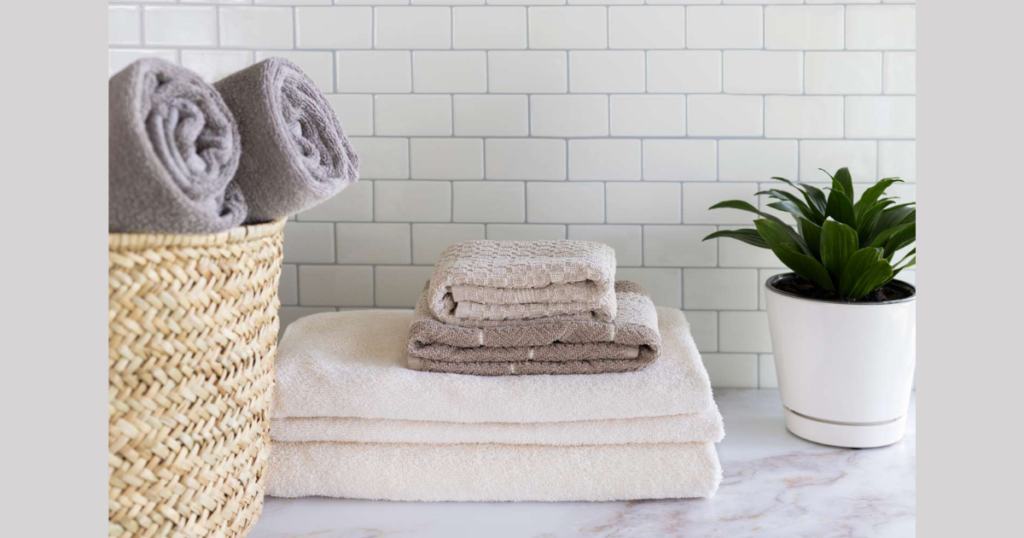 Store Towels with Baskets and the Rolled Folding Method