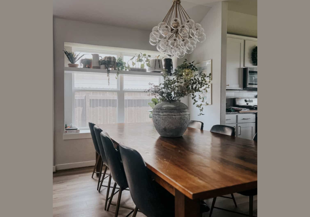 Dark Wood Dining Table with Greenery Centerpiece