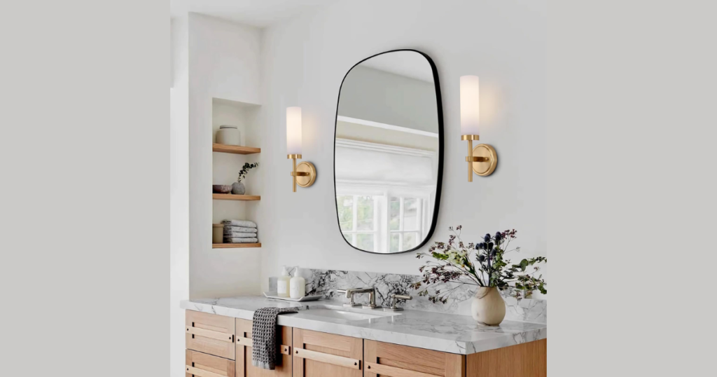 gold bathroom sconces for a warm luxury touch