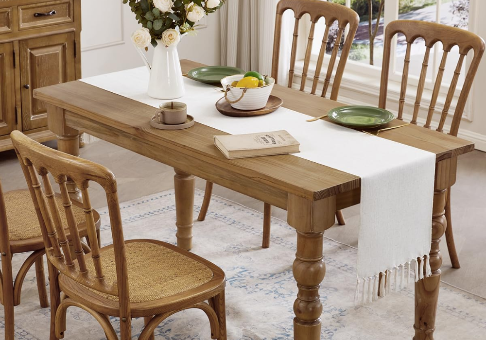 oak dining table with linen runner