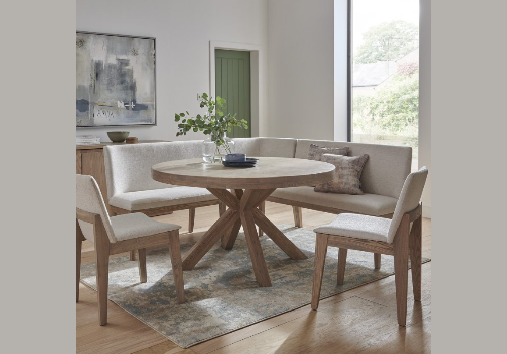 round dining table in a corner dining nook