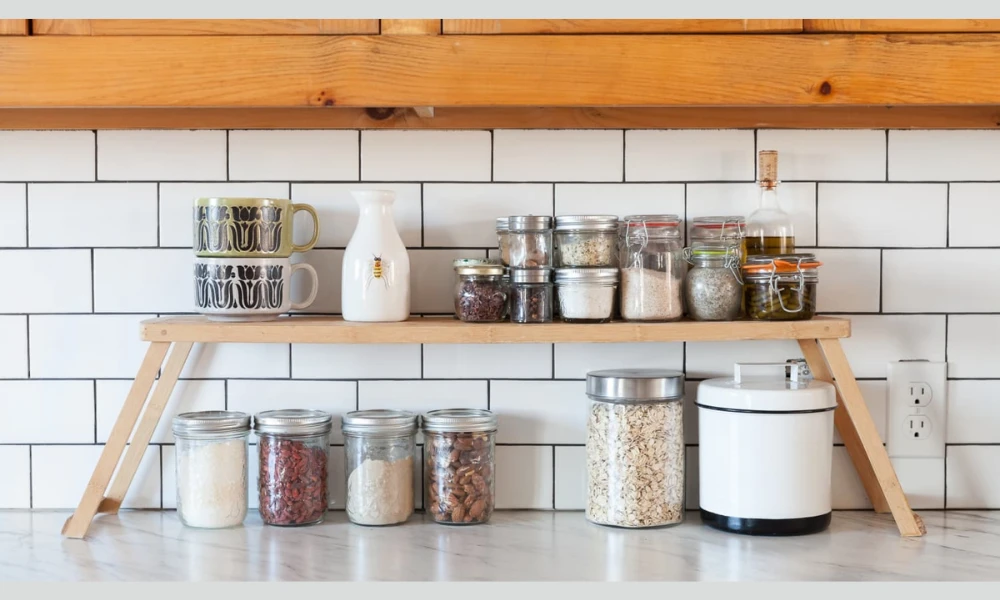 Glass jars for a clean and organized kitchen shelf look