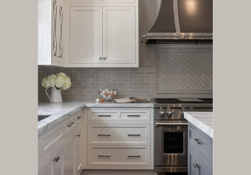 Grey Tile Backsplash with White Cabinets