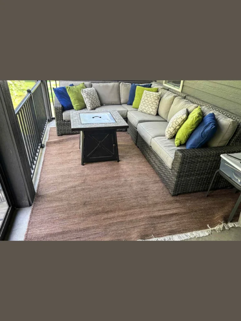  Use Weatherproof Area Rugs to Define the Space