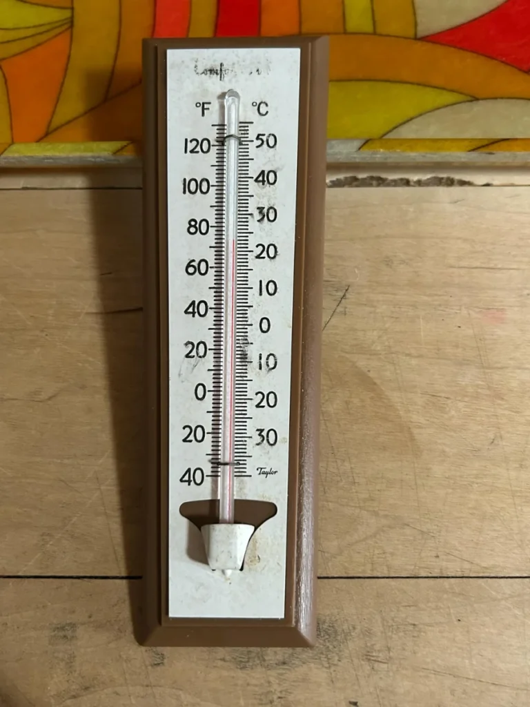 Diamond plate wall clocks and vintage thermometers