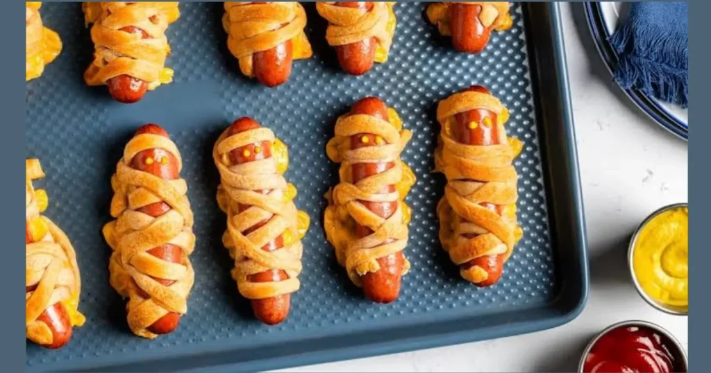 Top Crescent Roll Mummy Hot Dogs